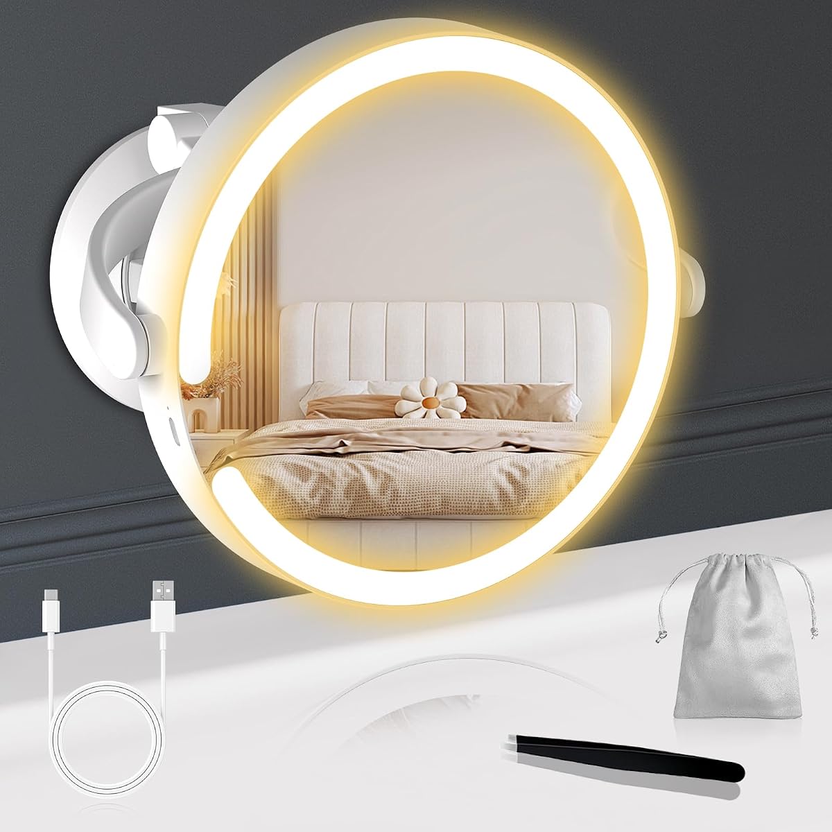 Miroir grossissant lumineux blanc à ventouse, fixé sur un mur clair de salle de bain.